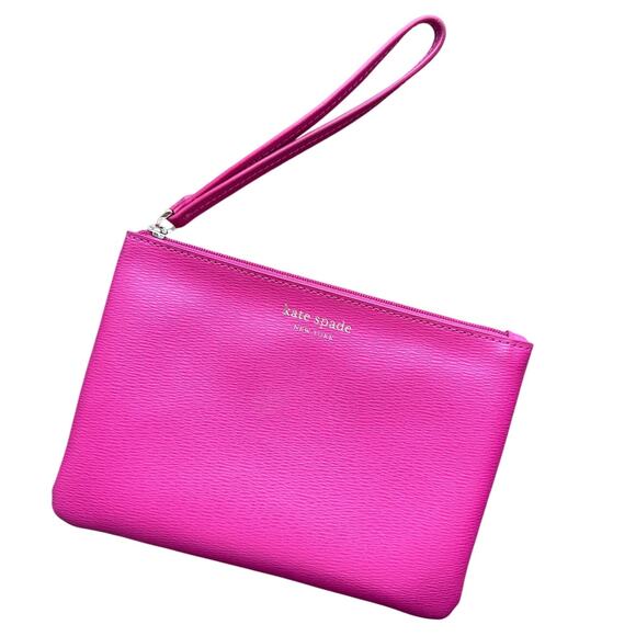 kate spade Handbags - Kate Spade Keaton Wristlet Magenta Pink